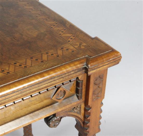 A Victorian Gothic revival walnut and marquetry rectangular card table, in the manner of Lamb of Manchester, W.3ft 2in.